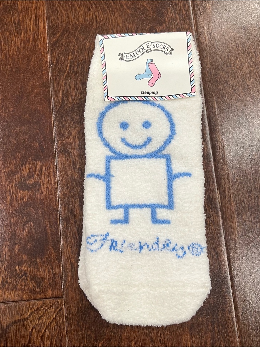 White Cozy Sleeping Socks with Blue Smiley Graphic